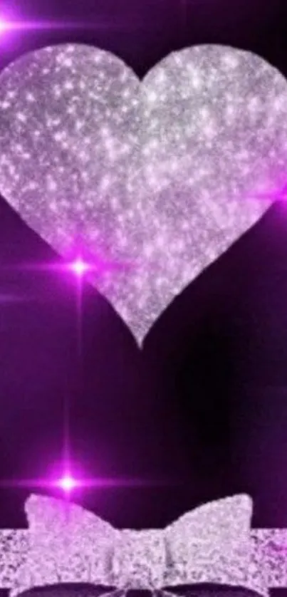 Sparkling silver heart and bow on a purple background wallpaper.