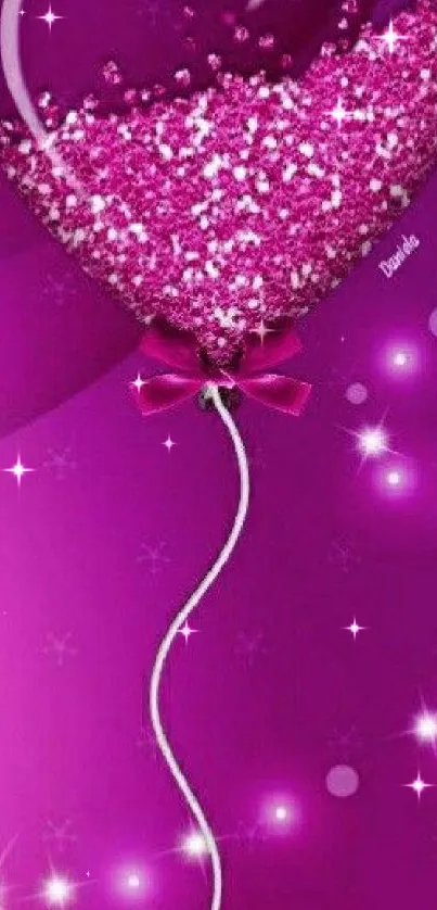 Vibrant pink heart balloon with glitter.