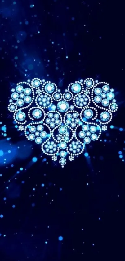 Sparkling heart of blue gemstones against dark blue background.