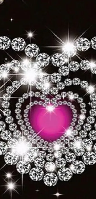 Sparkling diamond heart with pink gem on black background wallpaper.