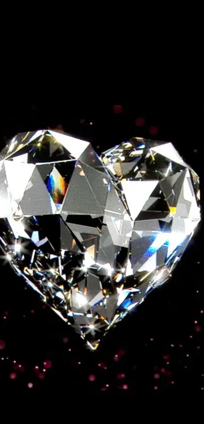 Heart-shaped diamond on black background with sparkling effect.