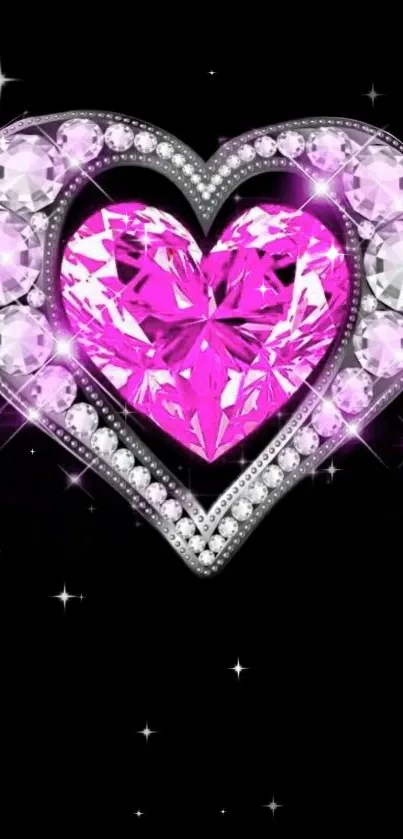 Vibrant pink heart gem with crystal accents on a black background.