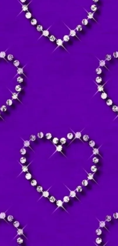 Purple wallpaper with gem-encrusted hearts.