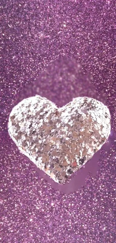 Pink glitter wallpaper with sparkling heart design.