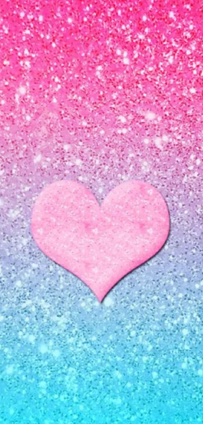 Pink heart on glittery pink to blue gradient background wallpaper.