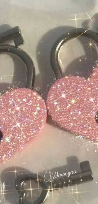 Glittery pink heart locks with keys on a mobile wallpaper.