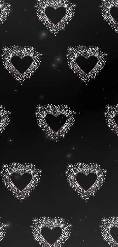 Black wallpaper with sparkling heart pattern design.