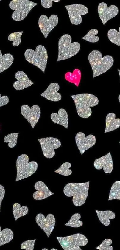 Black wallpaper with sparkling silver and pink hearts.