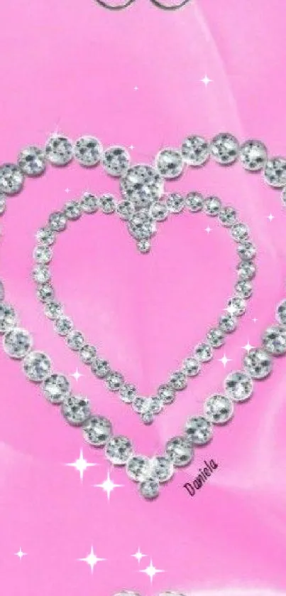 Pink heart wallpaper with crystal embellishments.