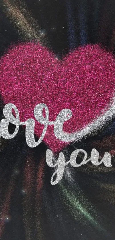 Pink glittery heart with 'love you' text on black background.