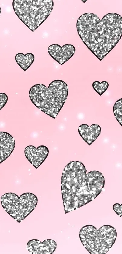 Pink wallpaper with glittery hearts design.