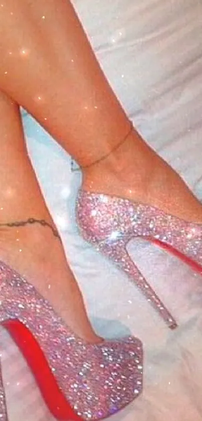 Sparkling high heels on a vibrant pink bed.