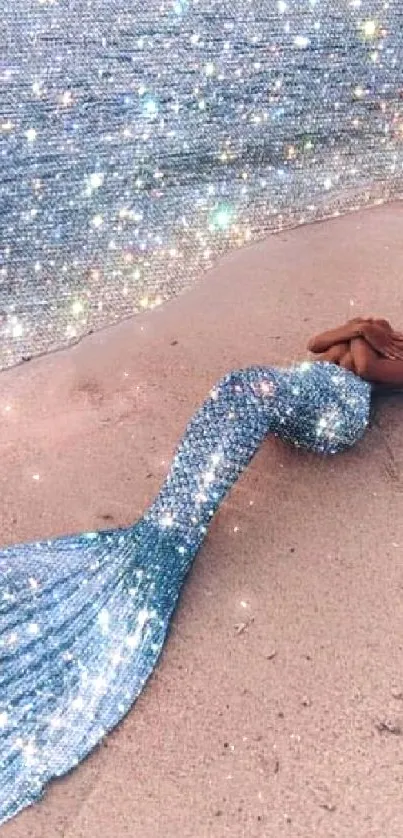 Mermaid with shimmering tail on sandy beach under a starry sky.