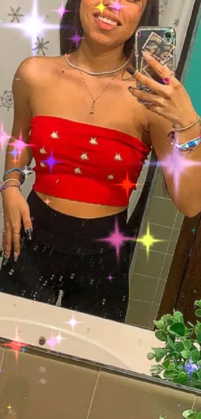 Mirror selfie with red top and sparkles.