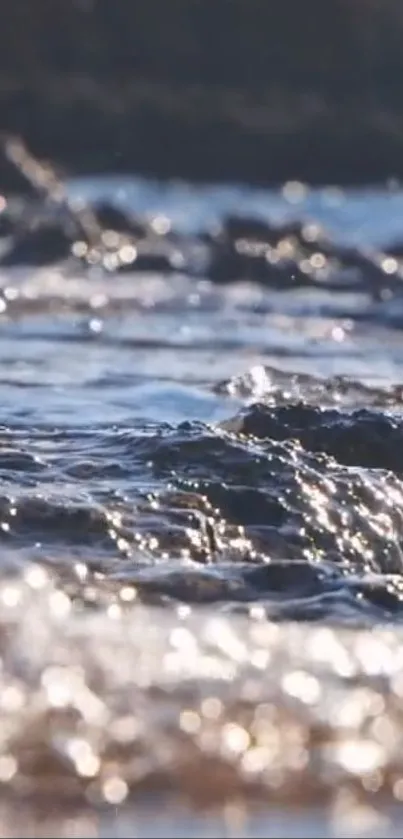 Close-up of ocean waves reflecting sunlight.