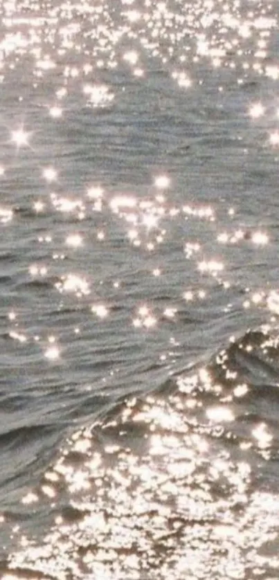 Wallpaper with sparkling ocean waves under sunlight.