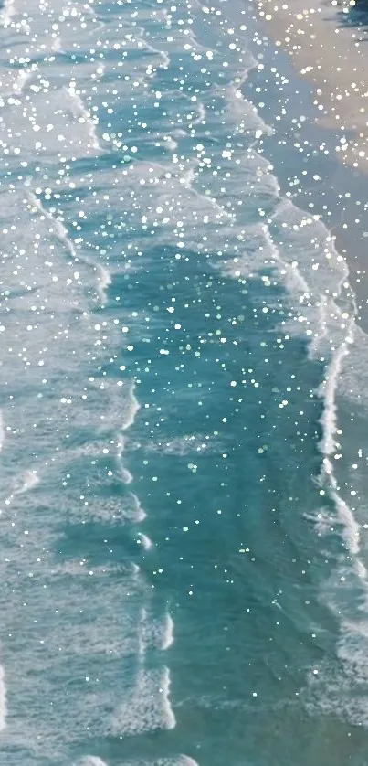 Mobile wallpaper showing sparkling ocean waves and sandy beach.