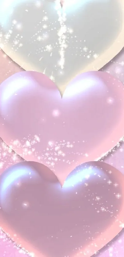 Three shimmering pastel hearts with sparkles on a pink background.