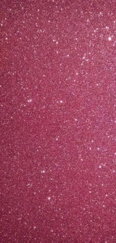 Sparkling pink glitter wallpaper with a shimmering effect.