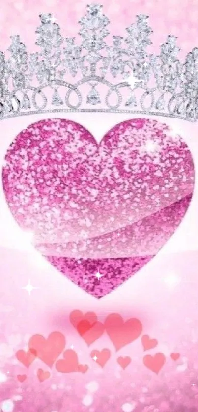 Pink heart with silver crown, glittery background.