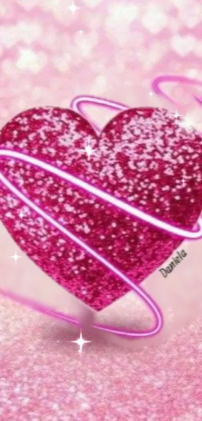 Sparkling pink heart with shimmering accents on a glittery background.