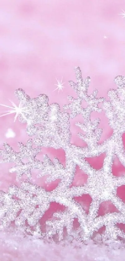 Sparkling pink snowflake on a frosty backdrop, perfect for mobile wallpaper.