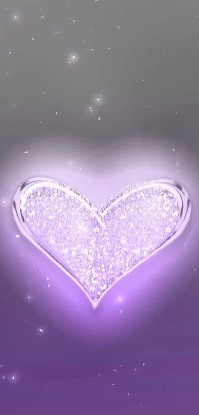 Glittering purple heart on gradient background.