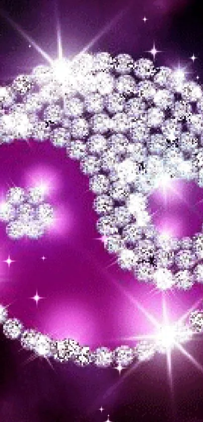 Sparkling purple yin yang design with crystals and deep purple background.