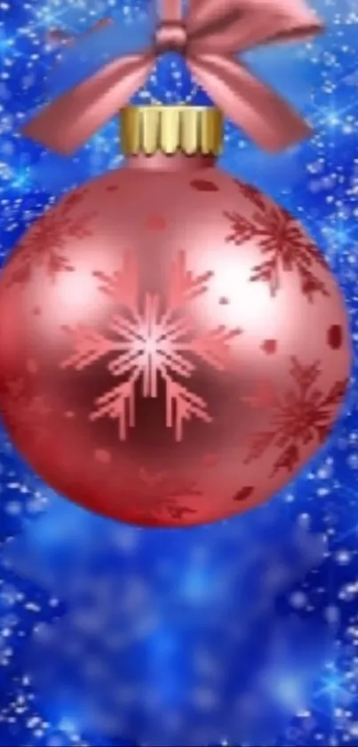 Red ornament with snowflakes on blue background.