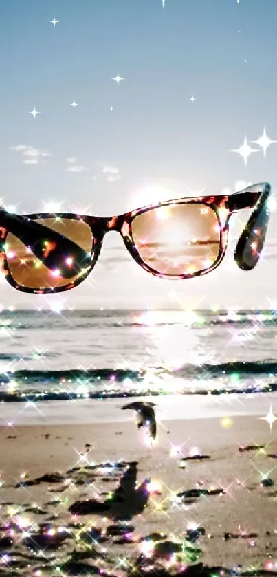 Sunglasses capturing a sparkling beach with sunlit ocean.