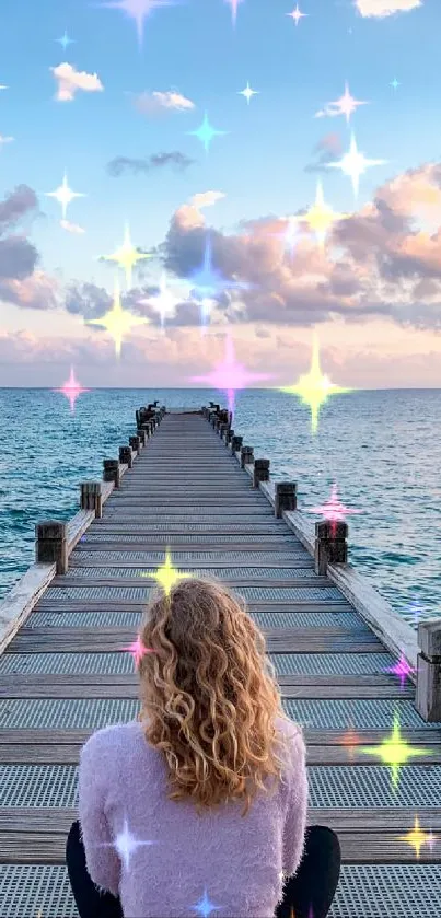 Woman on pier at sunset with sparkling stars over the ocean.