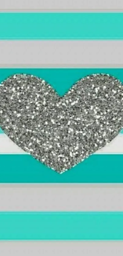 Glitter heart on turquoise striped wallpaper.