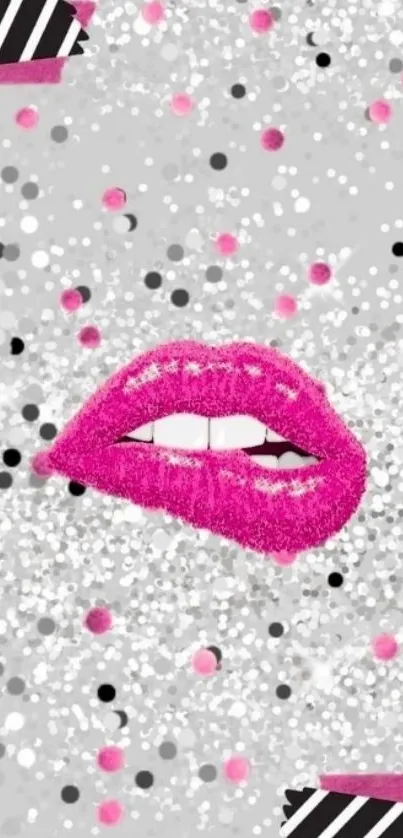 Bright pink glitter lips on a sparkly gray background.