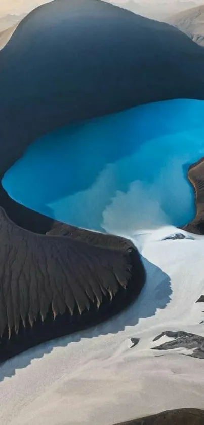 Aerial view of a blue lake in a mountainous crater.