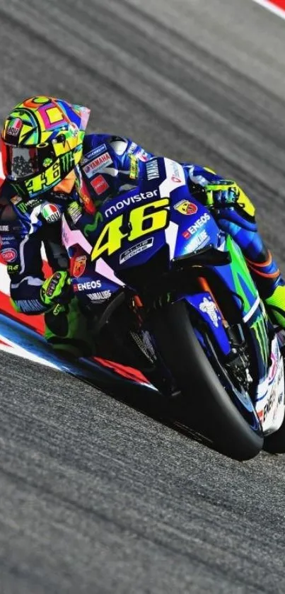 MotoGP racer in dynamic high-speed action, showcasing vibrant colors.