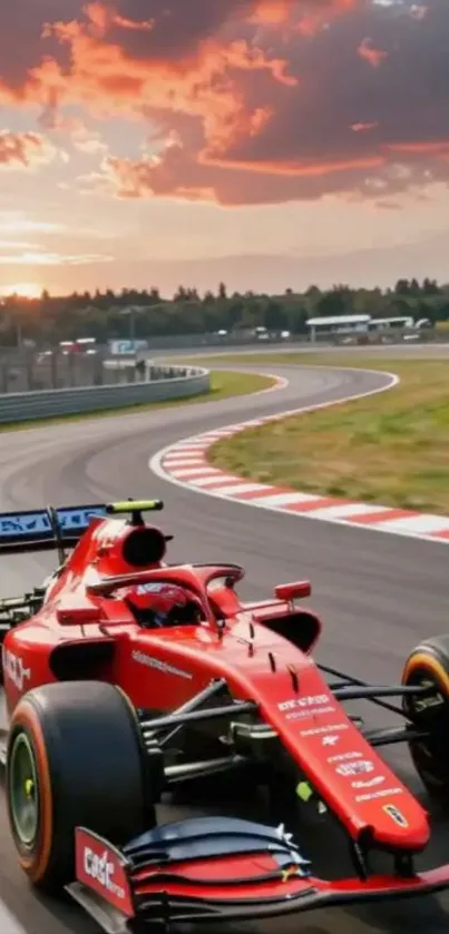 Red Formula 1 car racing on a track at sunset.