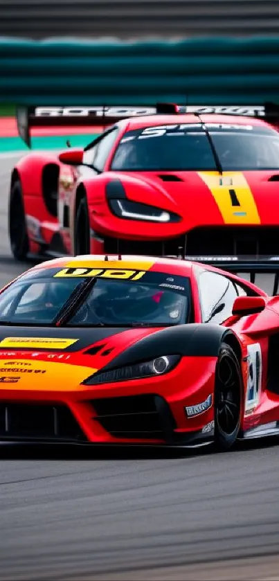 Two red sports cars racing on a track, showcasing speed and excitement.