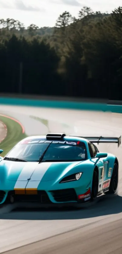 Teal race car speeding on scenic track surrounded by trees.