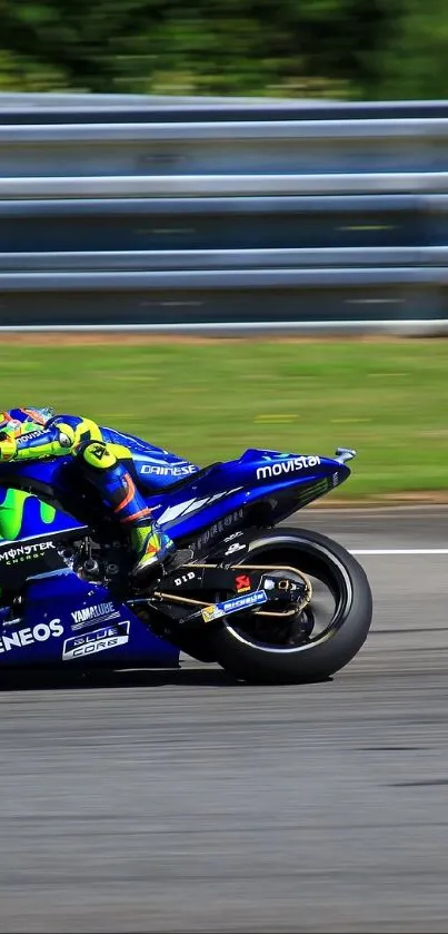 Blue motorcycle racing on a track, capturing speed in vibrant colors.