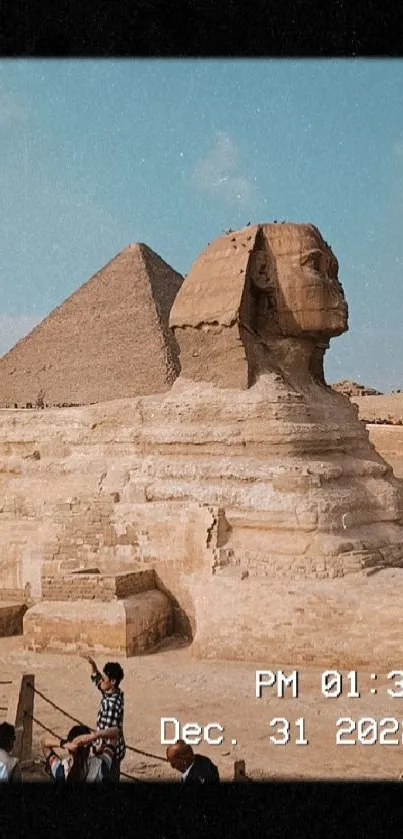 Vintage Sphinx and Pyramid mobile wallpaper with film timestamp.