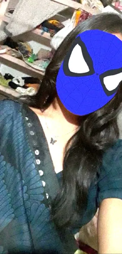 Woman with Spiderman mask in blue attire, casual setting.