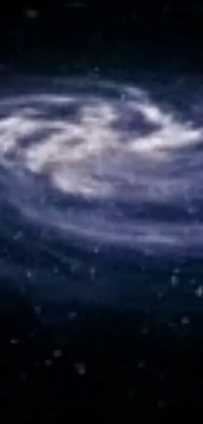 Spiral galaxy with swirling stars against a dark blue cosmic background.