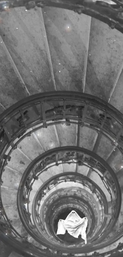 Eerie spiral staircase with ghostly figure in black and white.