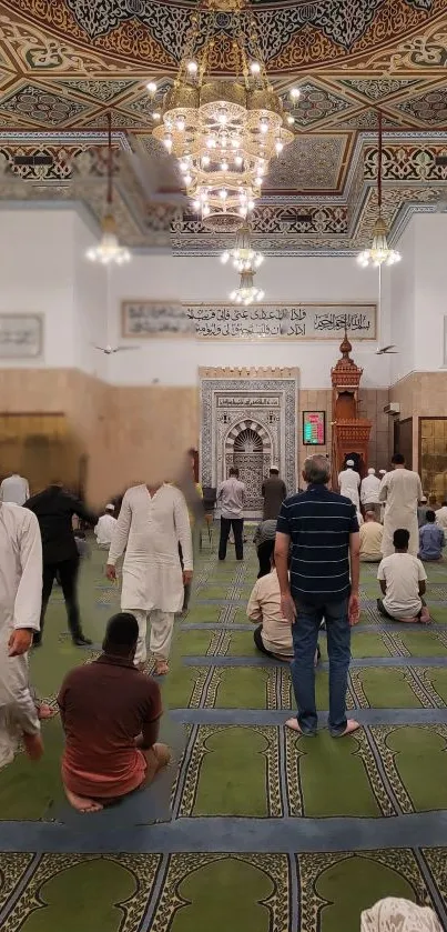 Serene mosque interior with worshippers and intricate ceiling design.