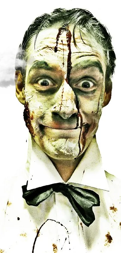 Eerie clown with painted face and bowtie, horror-themed mobile wallpaper.