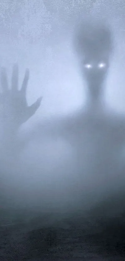 Eerie foggy night wallpaper with shadowy figure and glowing eyes.