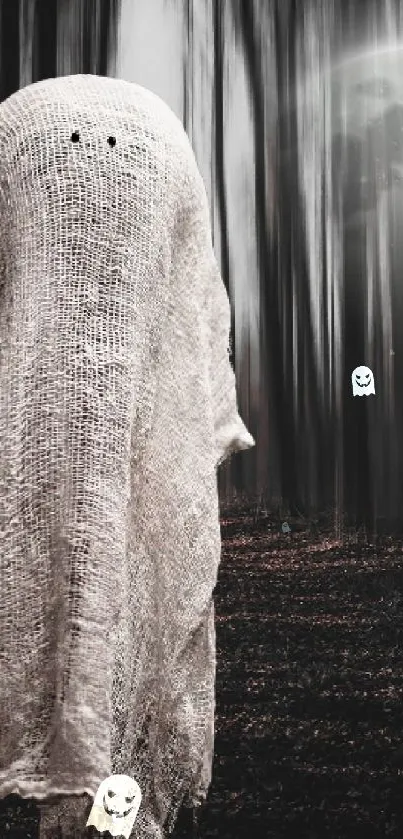 Ghostly figure in a moonlit forest wallpaper with dark mysterious trees.