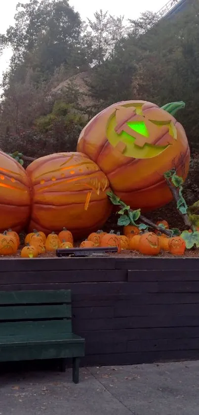 Halloween-themed wallpaper with huge pumpkins.