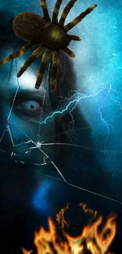 Horror-themed wallpaper with spooky face, spider, and fiery effect.