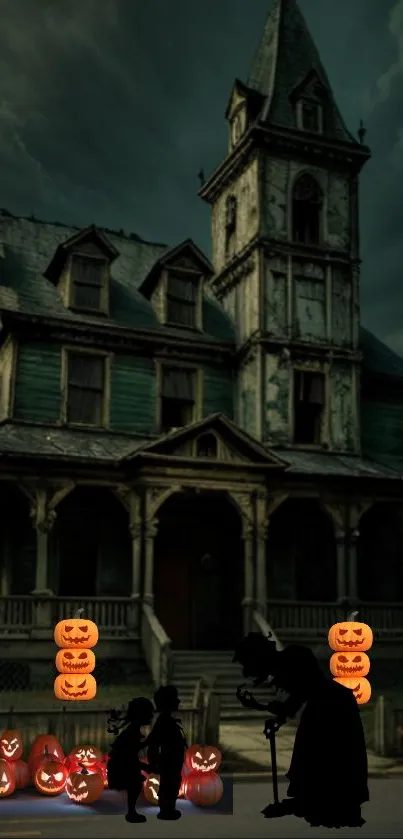Spooky haunted house with pumpkins and dark sky.